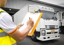gallery/warehouse-worker-hand-holding-clipboard-inspecting-load-shipment-control-with-trucks-freight-industry-logistics-transport_36860-619